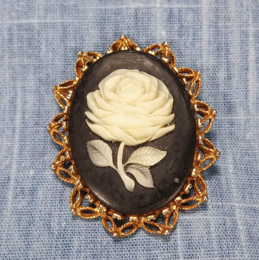 1950s Vintage White Rose Cameo on a Black Background