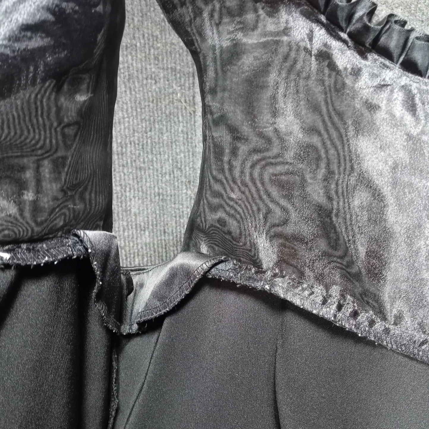 1950's Black Silk/Satin Peplum Wiggle Dress with an Organa Flower Bodice