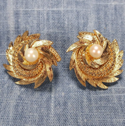 1960s Vintage Gold Tone Metal Swirl Earrings with a Pearl Bead Center