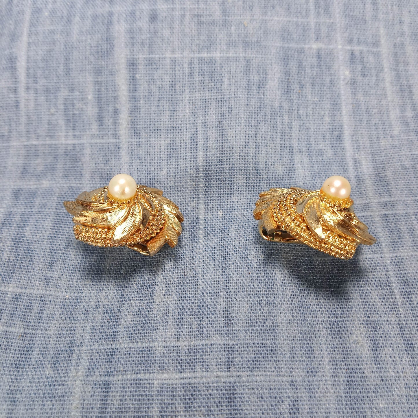 1960s Vintage Gold Tone Metal Swirl Earrings with a Pearl Bead Center