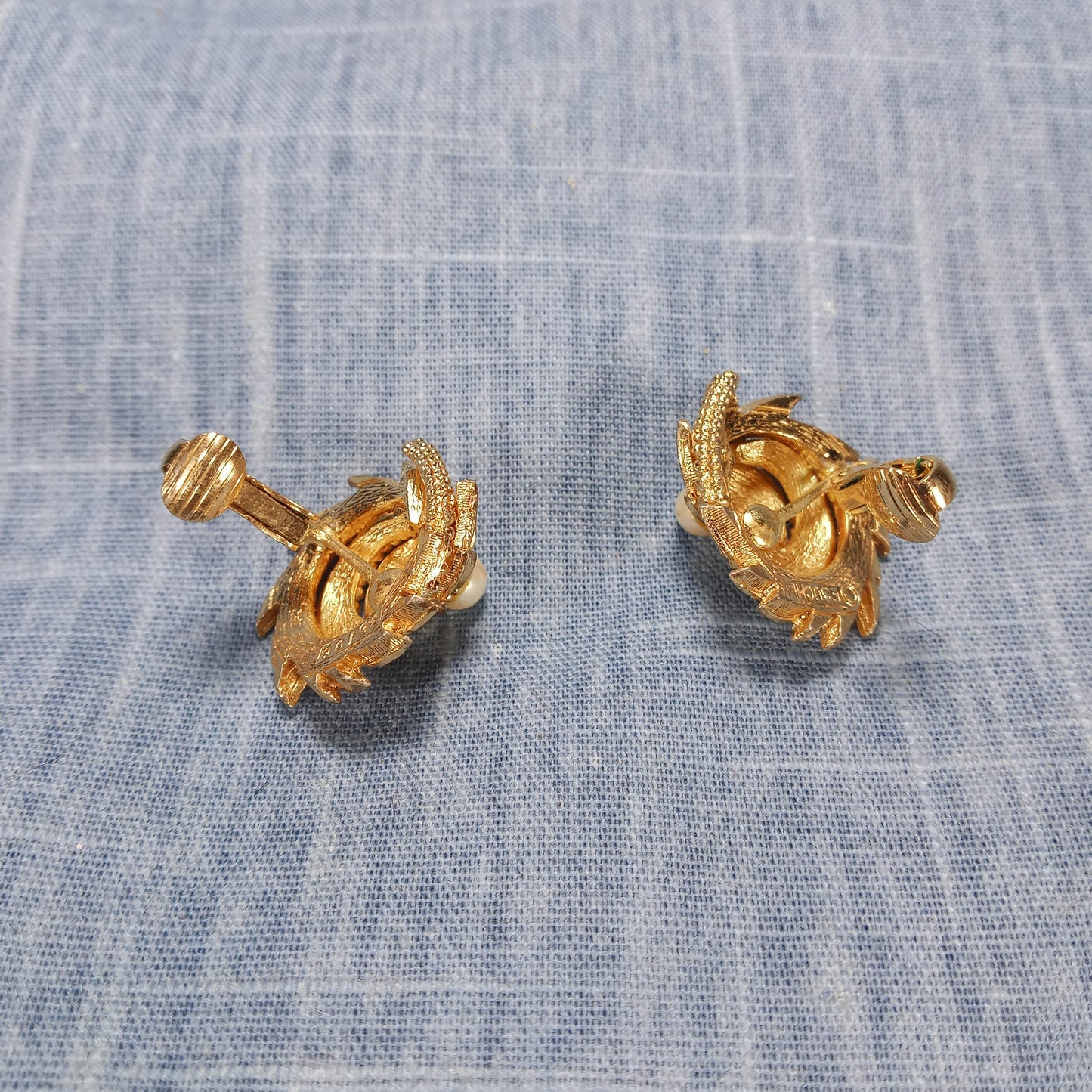 1960s Vintage Gold Tone Metal Swirl Earrings with a Pearl Bead Center