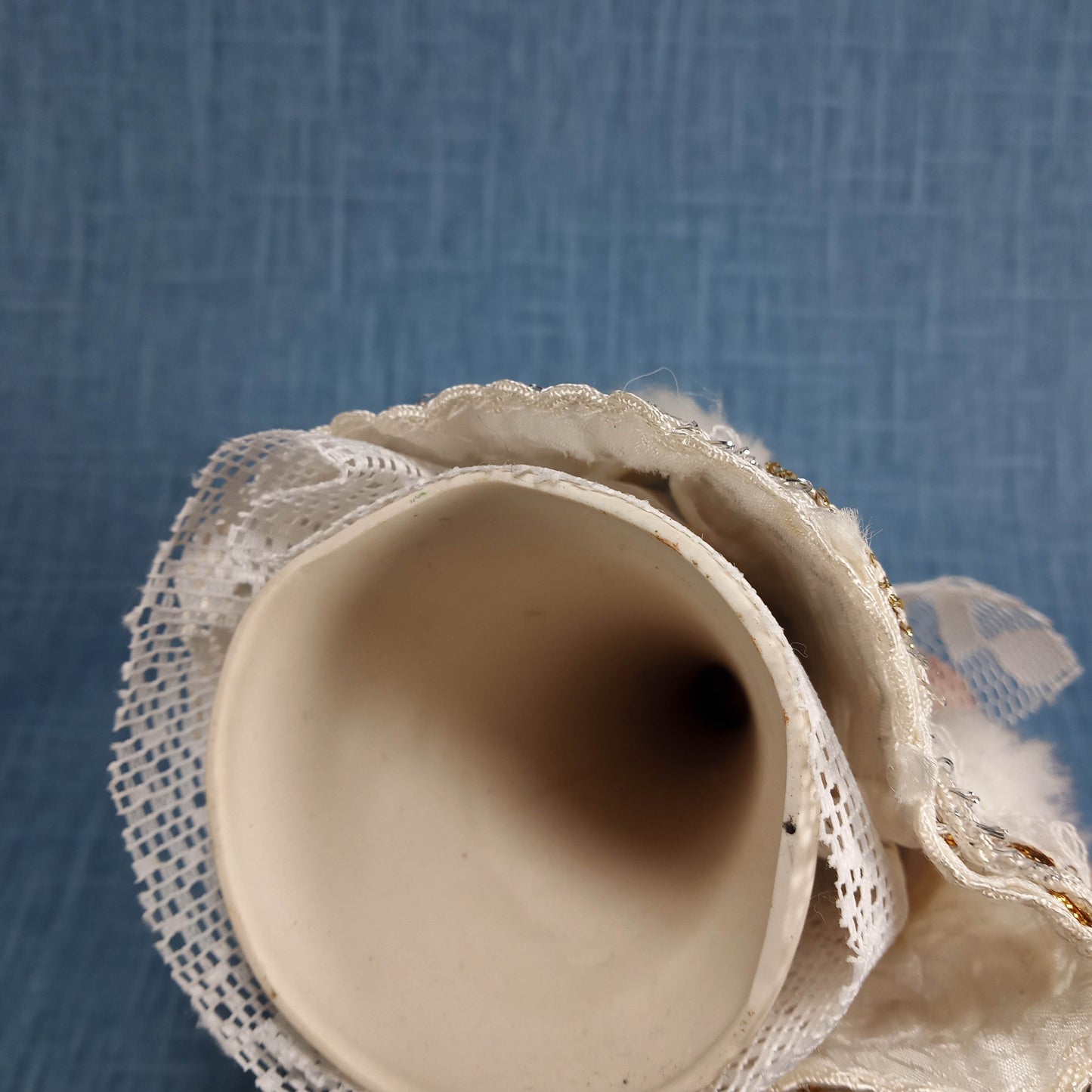 Vintage Porcelain Figurine: White and Blue in Traditional Dress