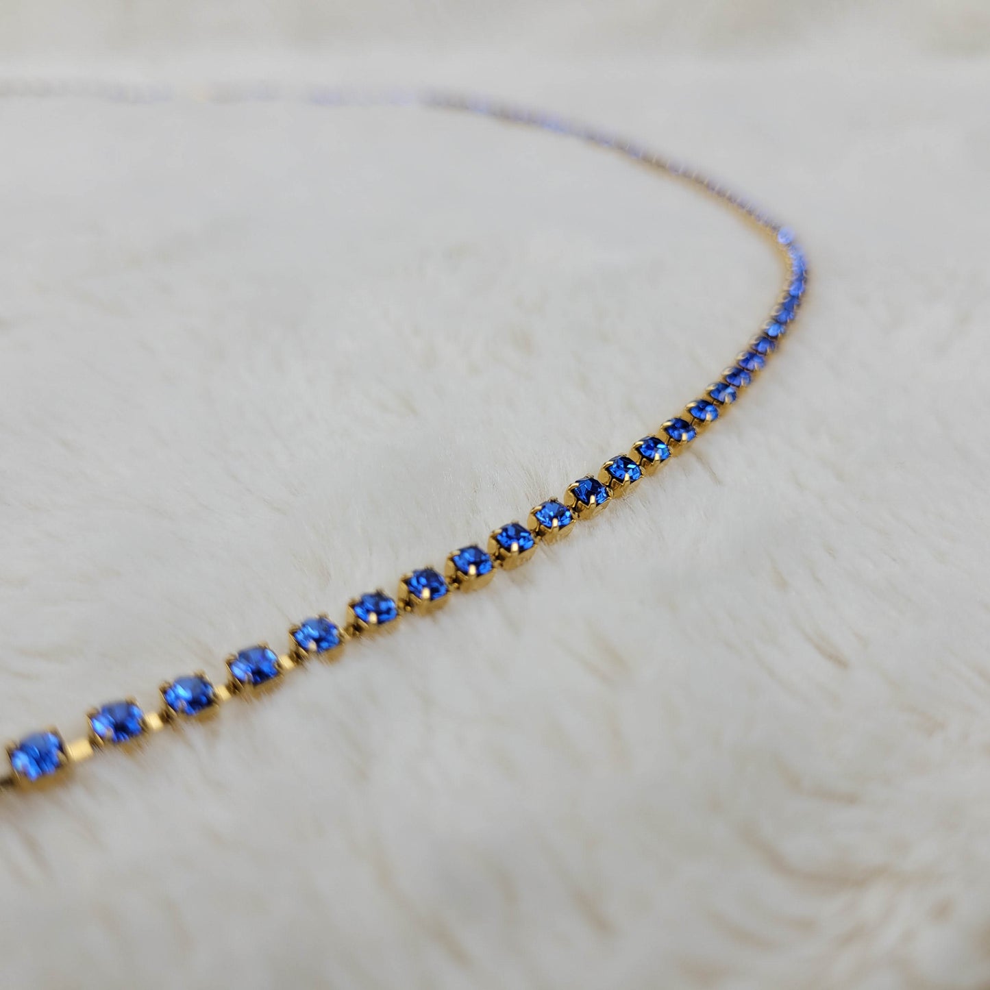 Blue Rhinestone Single Strand Necklace in Gold Tone Metal