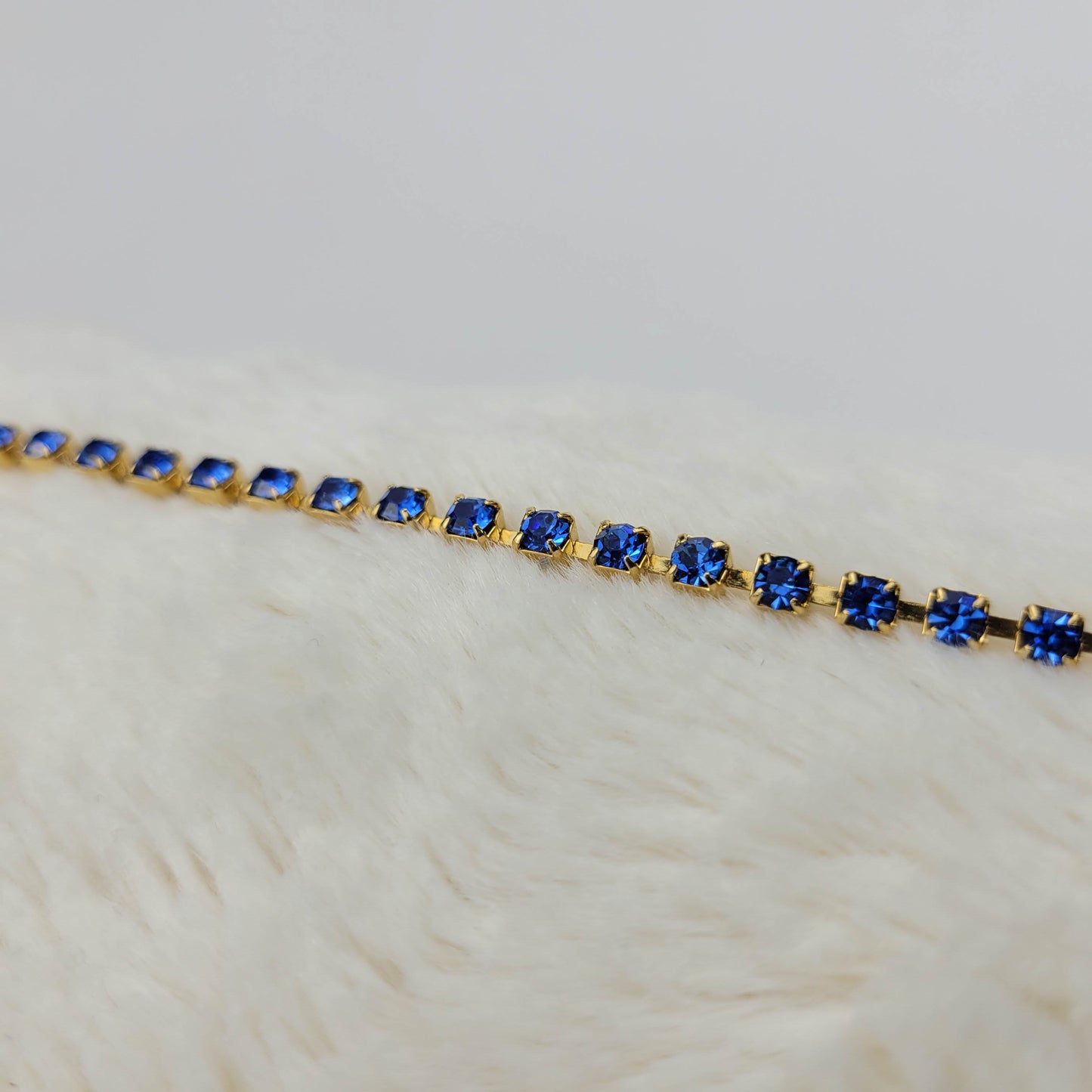 Blue Rhinestone Single Strand Necklace in Gold Tone Metal