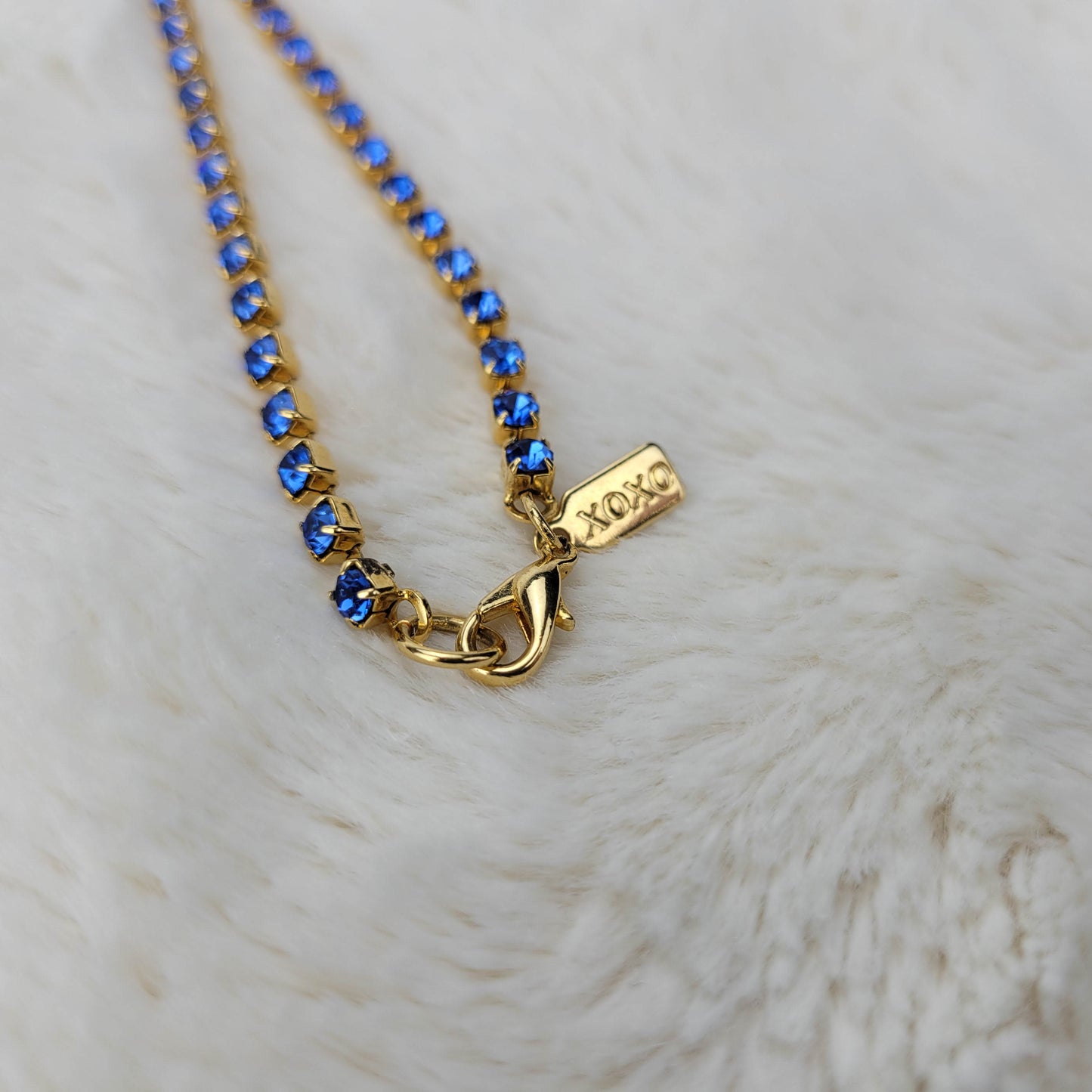 Blue Rhinestone Single Strand Necklace in Gold Tone Metal