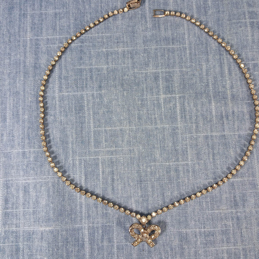 1990s Vintage Necklace with Clear Rhinestones and a Rhinestone Bow Pendant