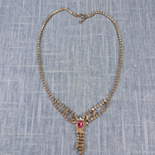 1950s Vintage Dangle Necklace with Clear Rhinestones and a Center Cut Pink Glass