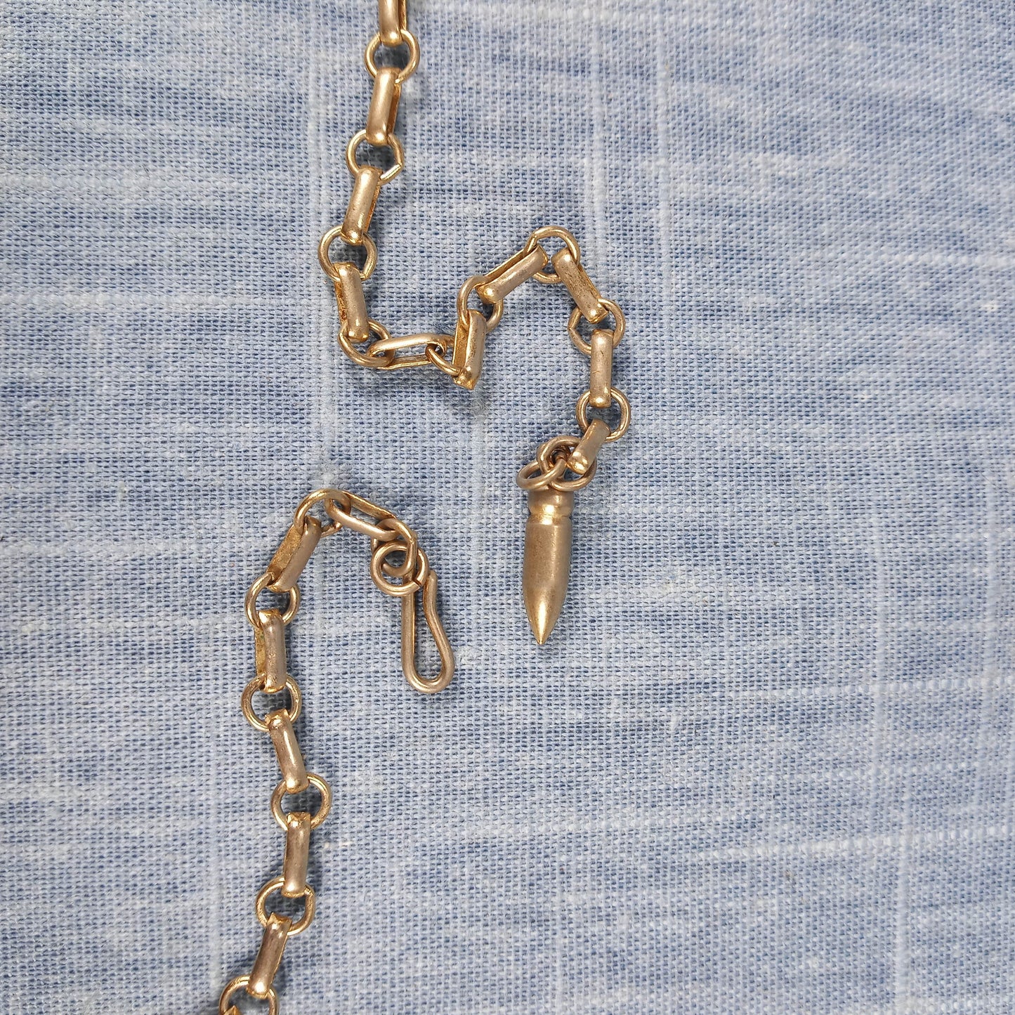 1970s Vintage Necklace with Gold Tone Winged Metal and Red Rhinestones