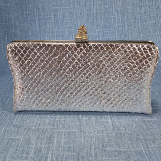 1960s Vintage Silver Clutch with a Black Lining