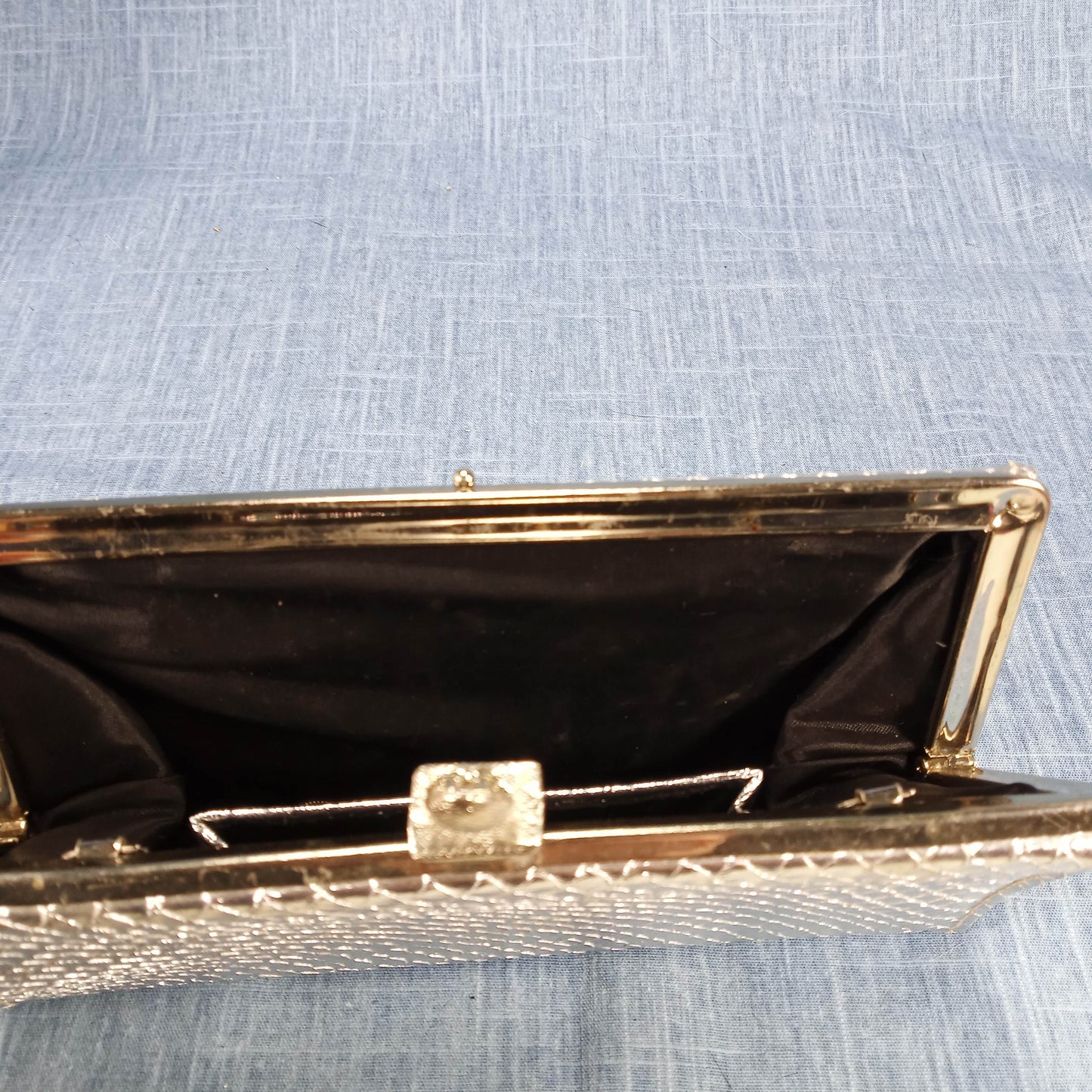 1960s Silver Clutch with a Black Lining