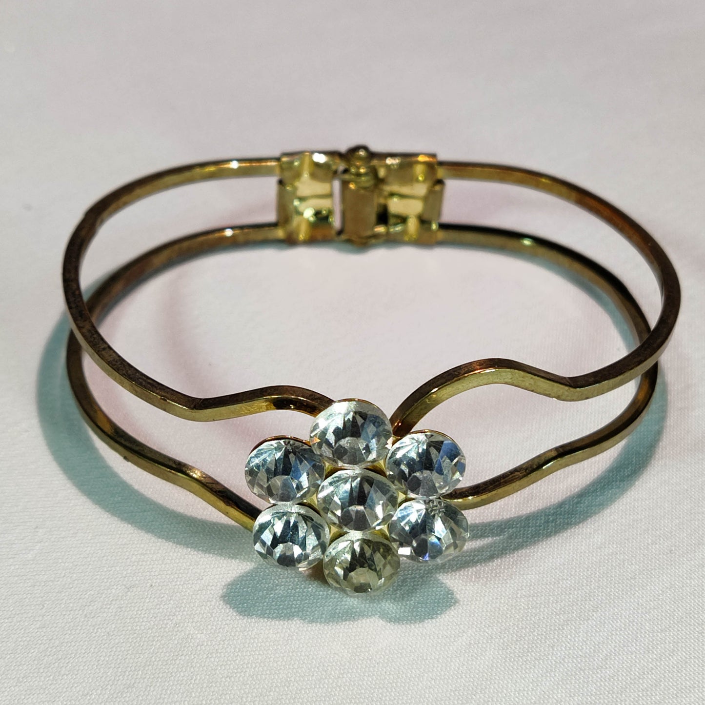 1960's Gold Tone Metal Clamper Flower Bracelet with Clear Rhinestones