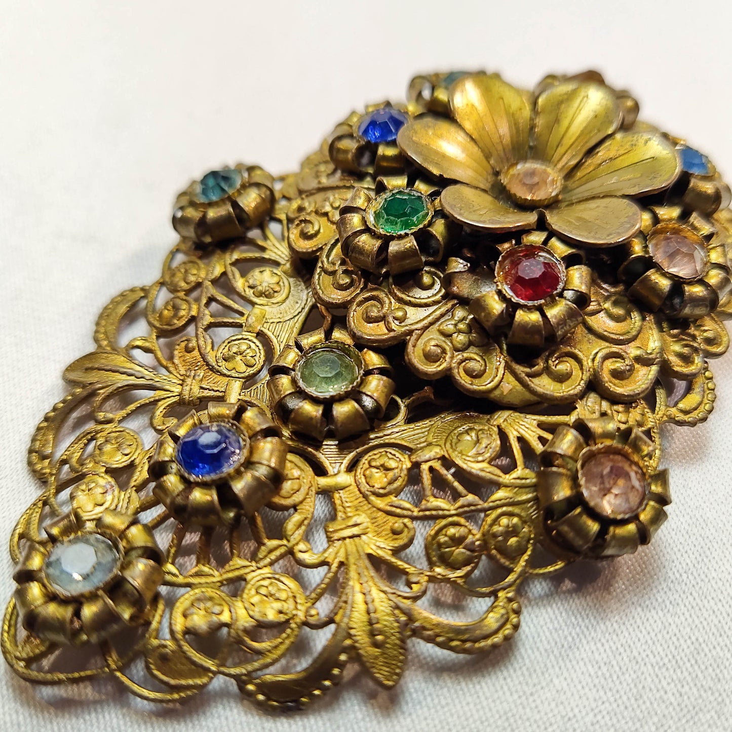 1920's Gold Tone Filigree Rhinestone Flower Fur Clip