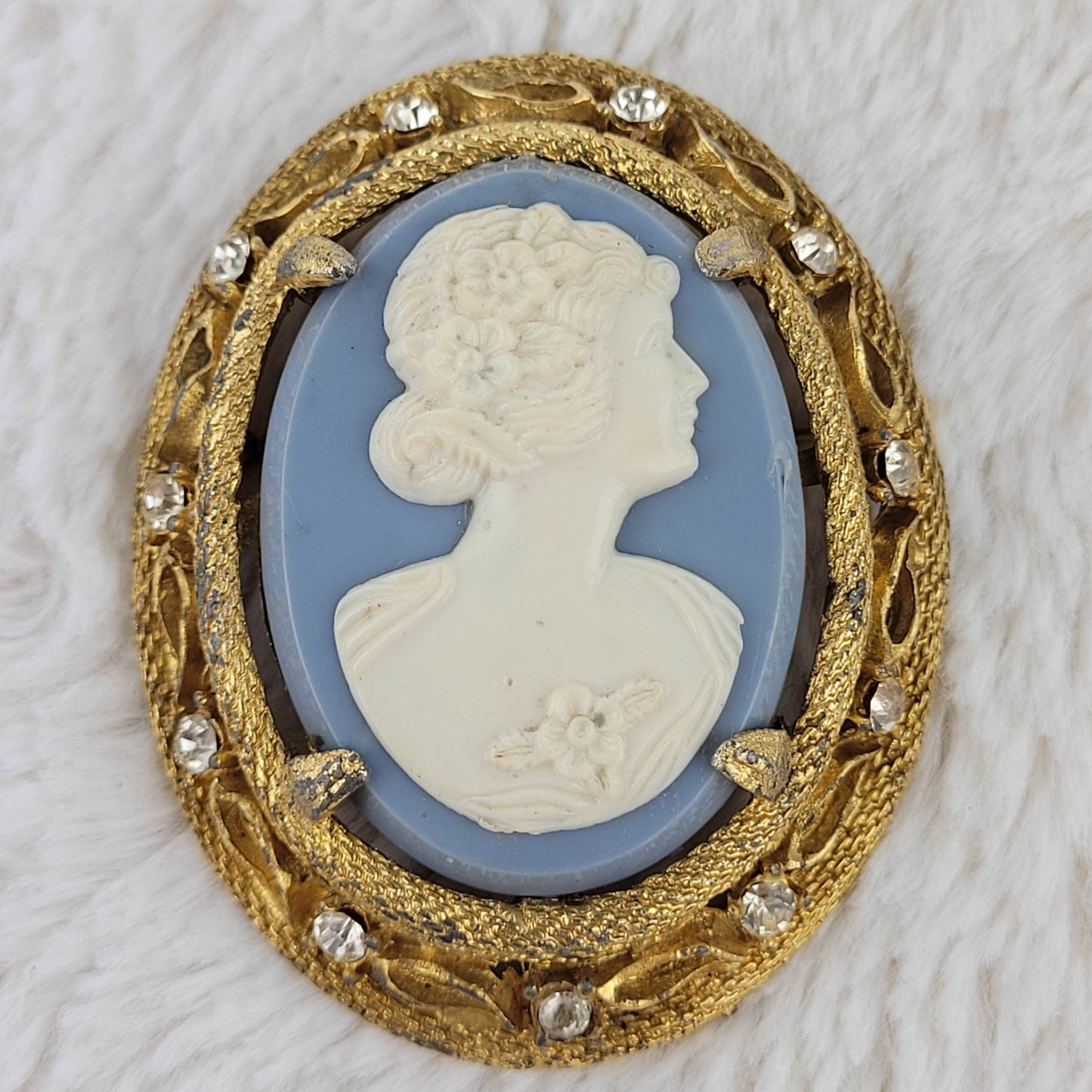 1960's White on Pale Blue Cameo with Gold Tone Metal Frame Pin