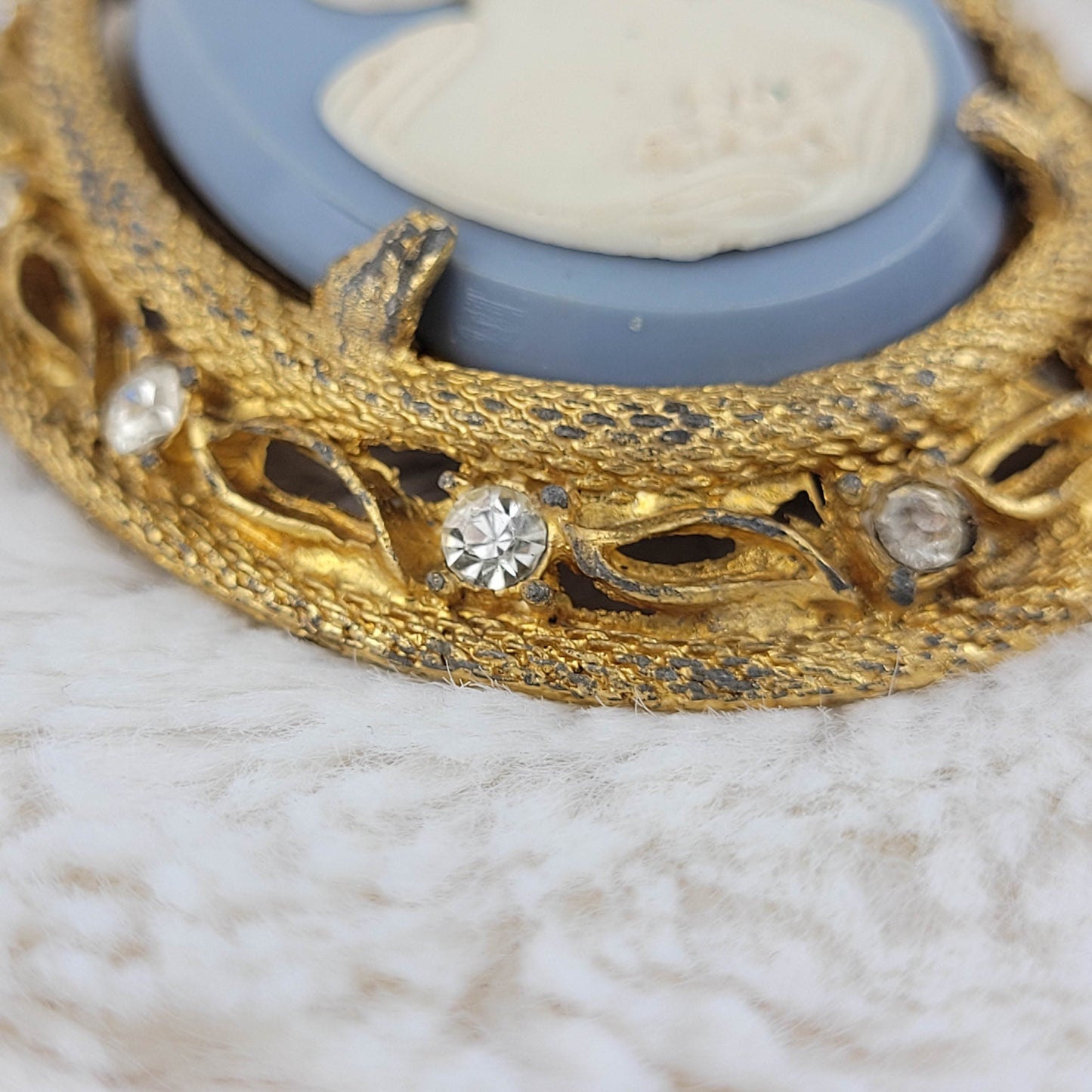 1960's White on Pale Blue Cameo with Gold Tone Metal Frame Pin