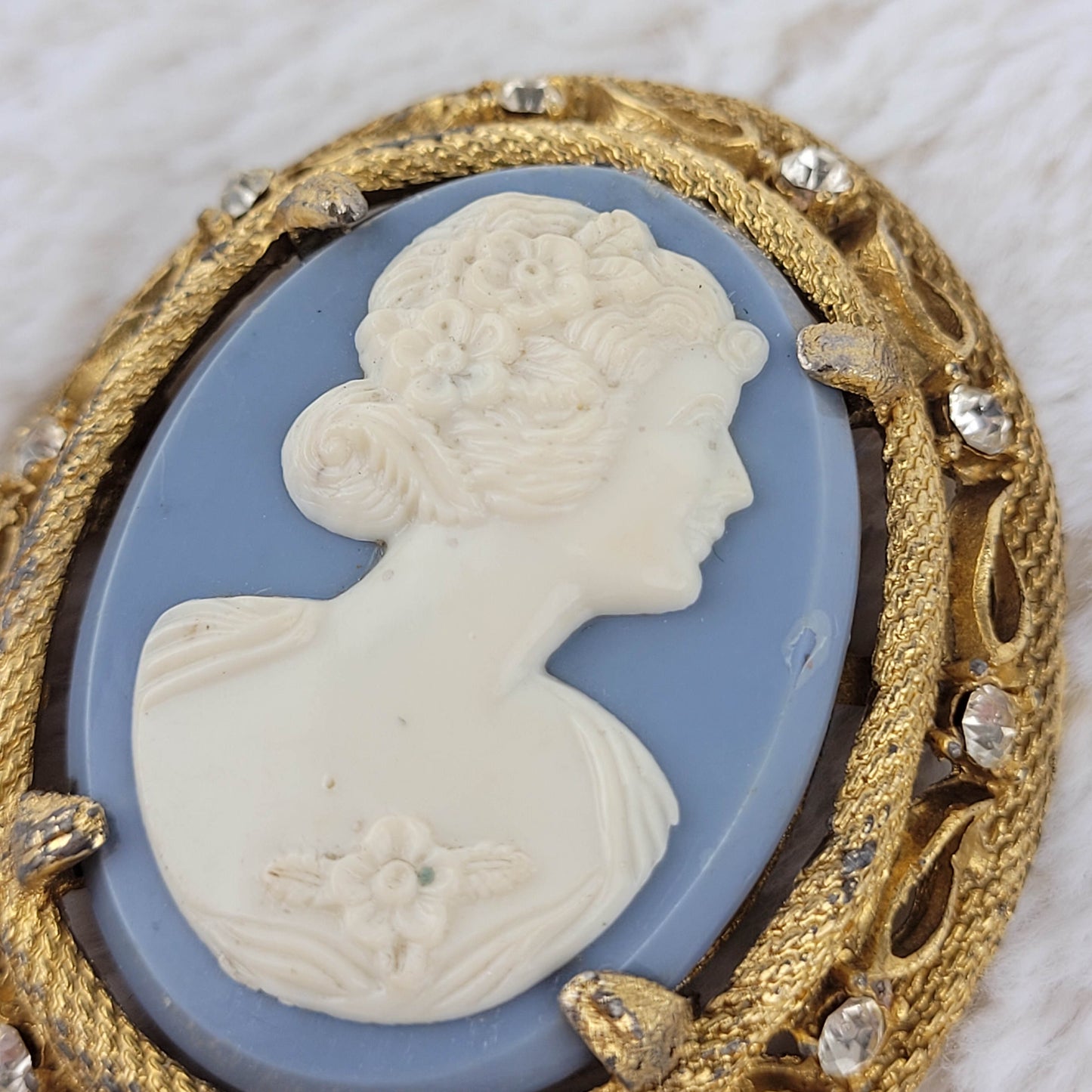 1960's White on Pale Blue Cameo with Gold Tone Metal Frame Pin