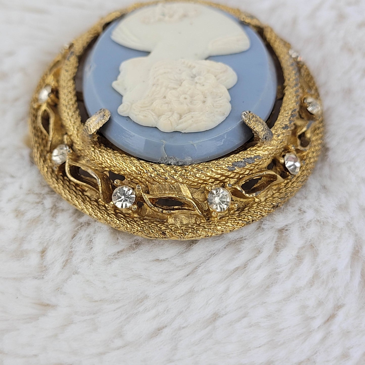 1960's White on Pale Blue Cameo with Gold Tone Metal Frame Pin