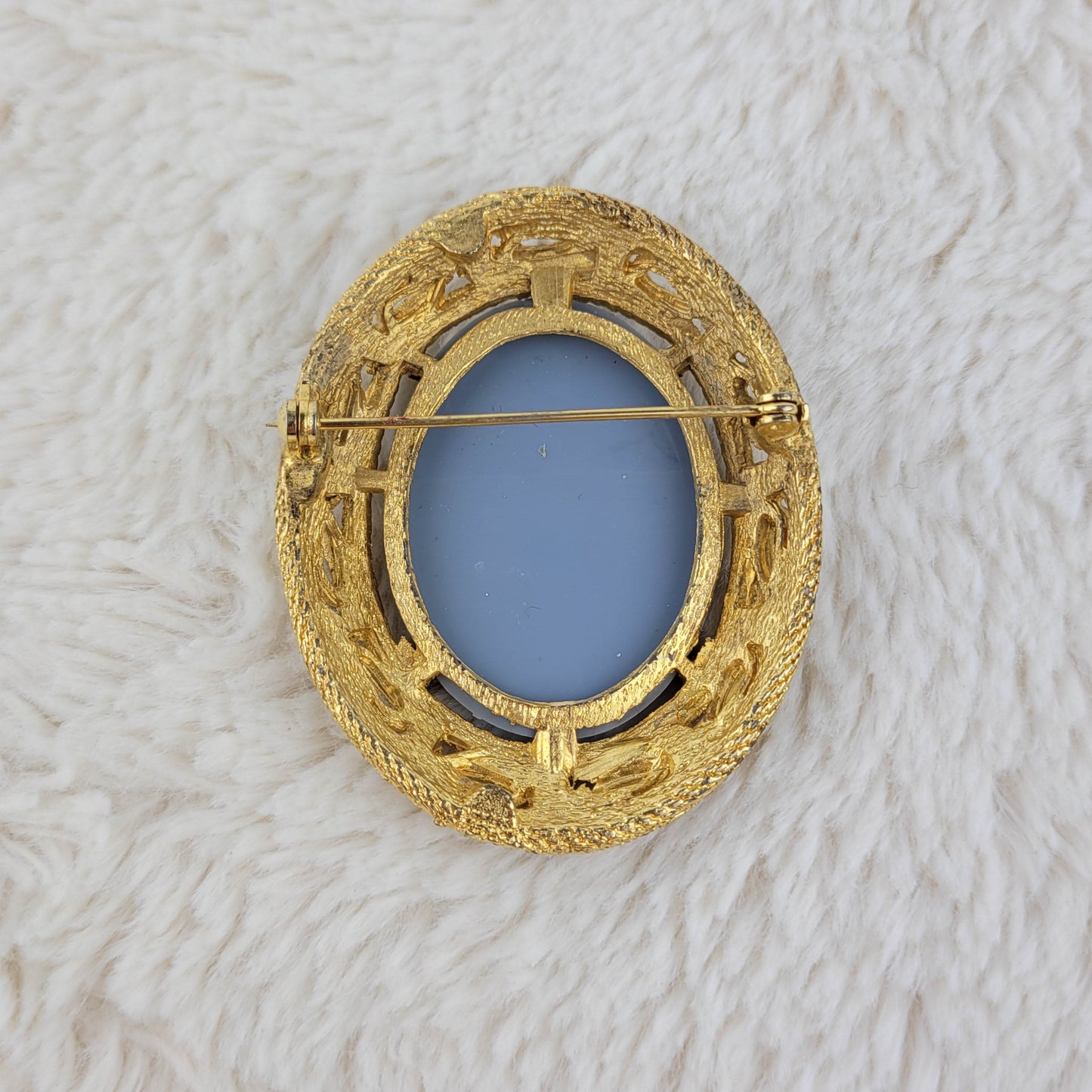 1960's White on Pale Blue Cameo with Gold Tone Metal Frame Pin