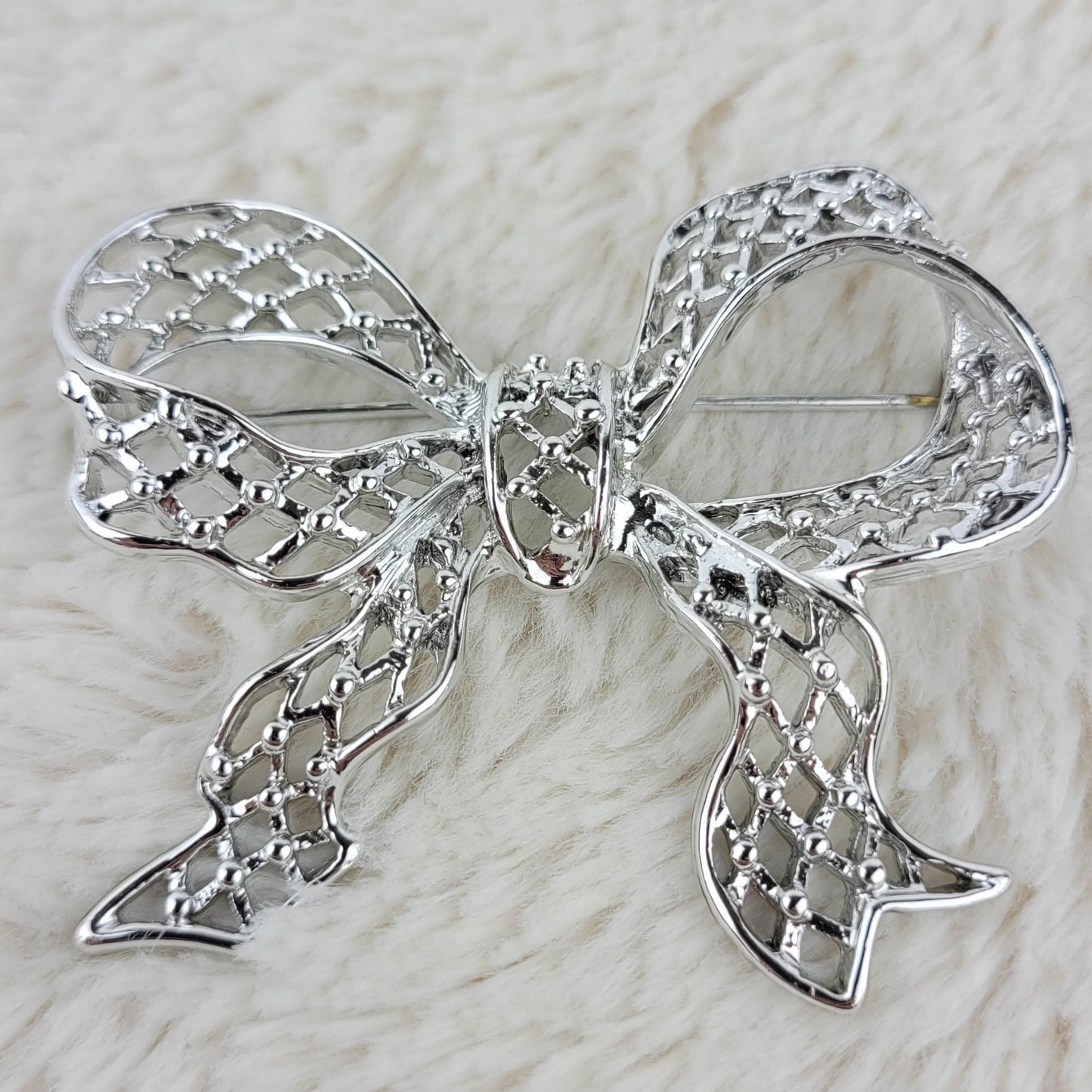 1960's Silver Tone Metal Filigree Bow Pin