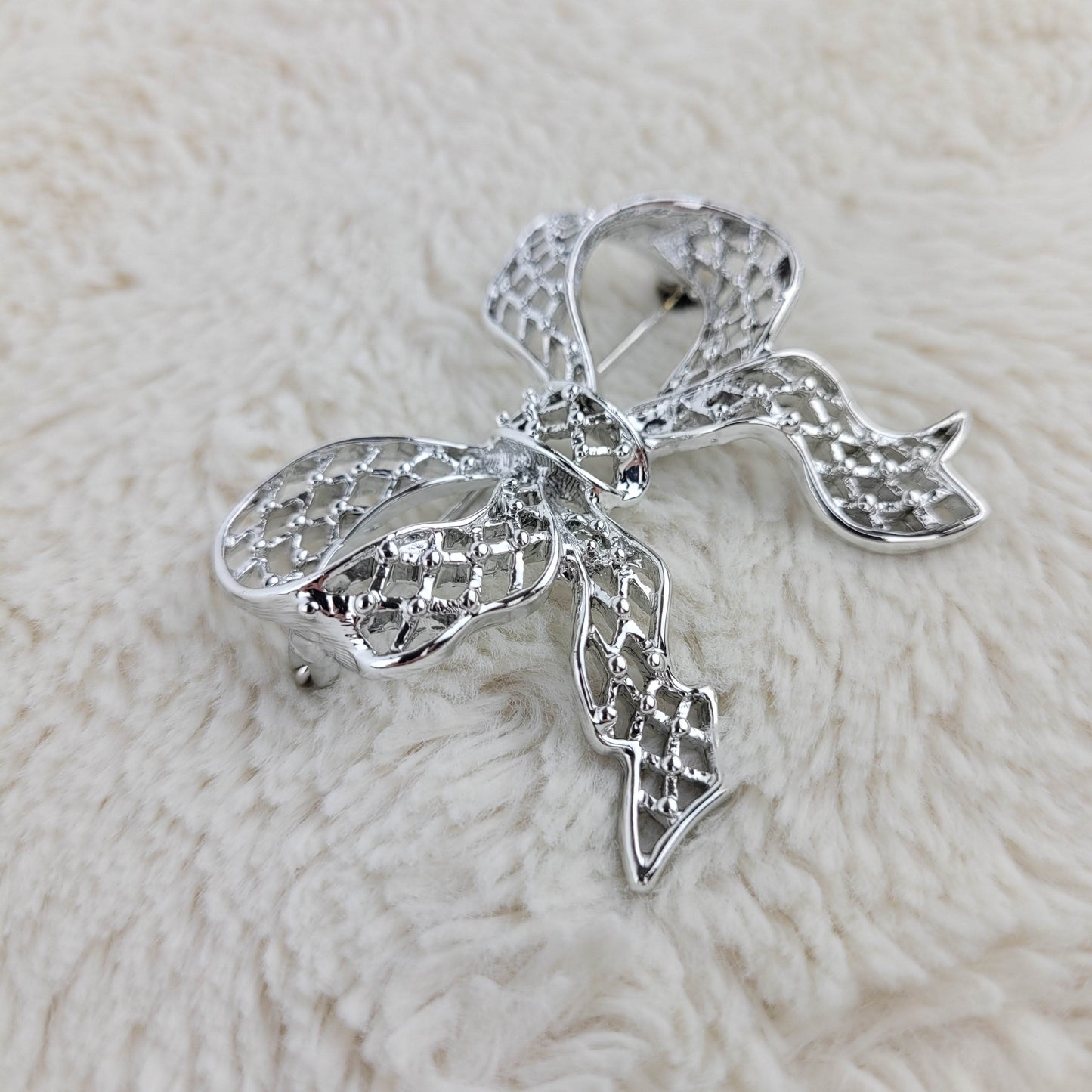 1960's Silver Tone Metal Filigree Bow Pin