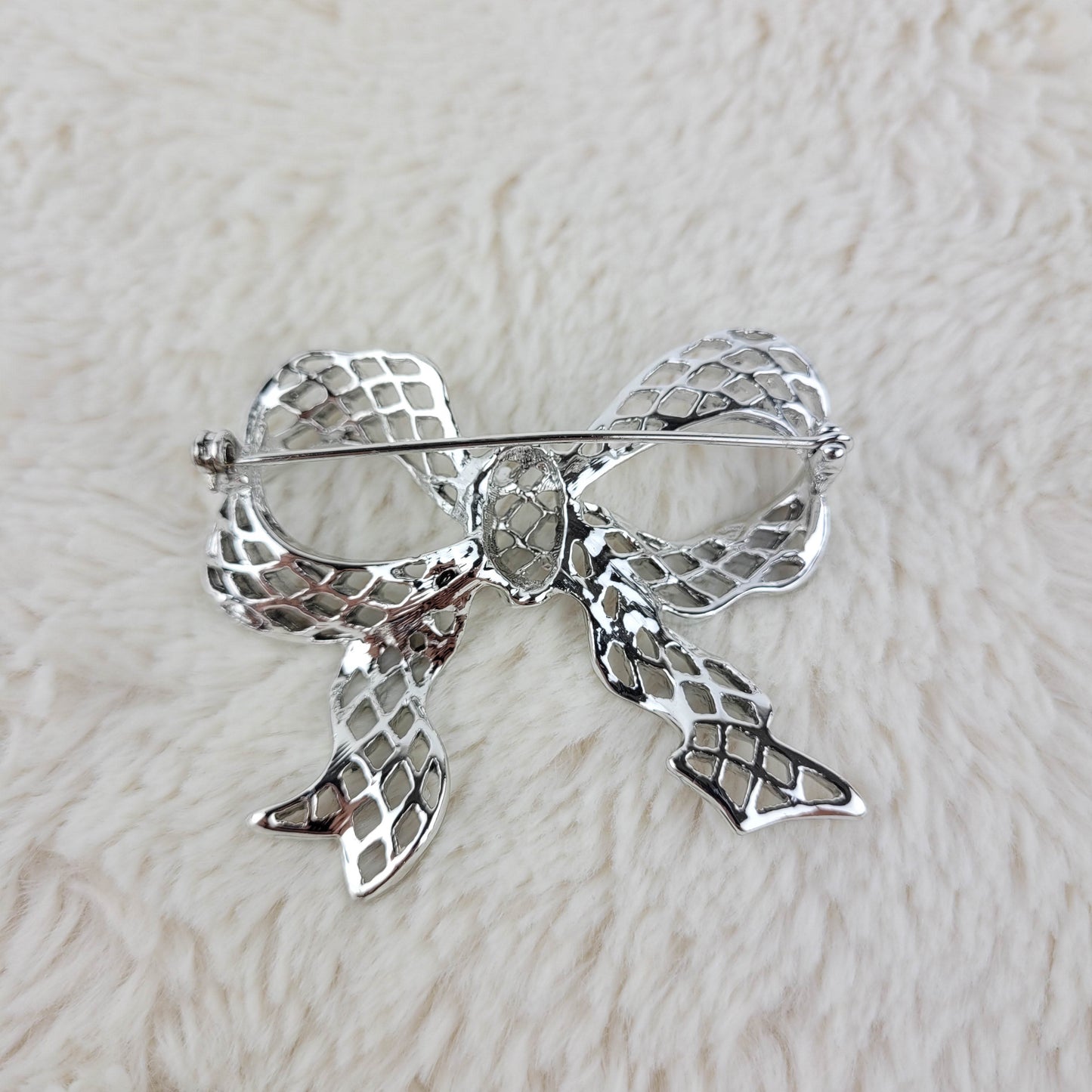 1960's Silver Tone Metal Filigree Bow Pin