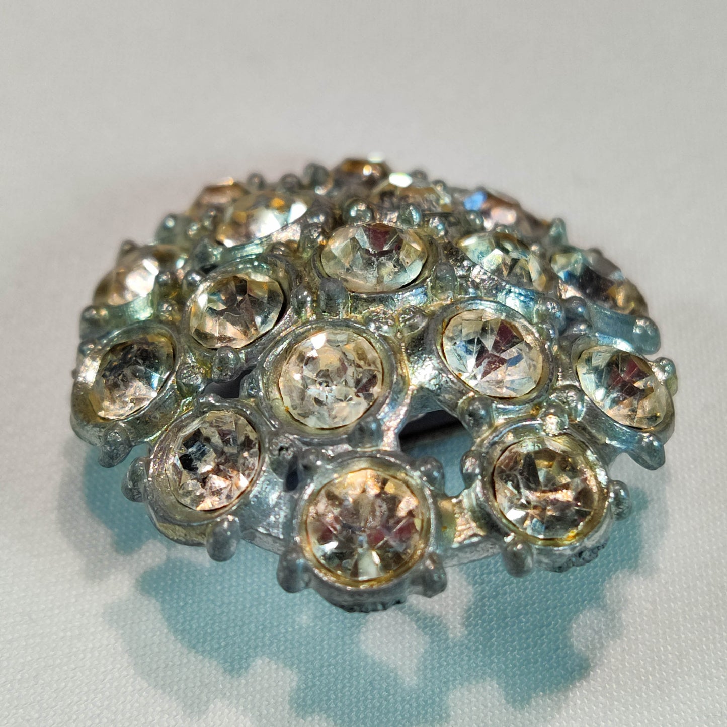 1950's Silver Tone Metal and Rhinestone Circular Pin