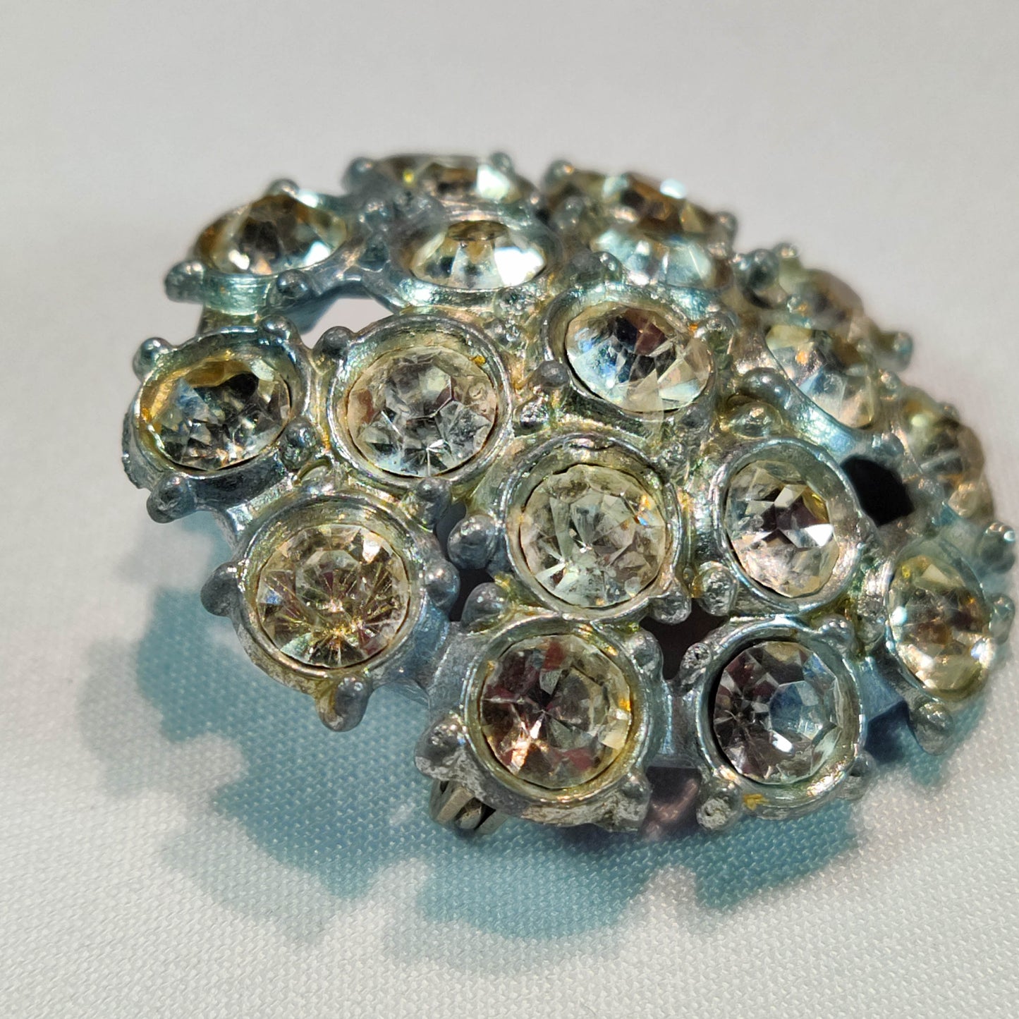 1950's Silver Tone Metal and Rhinestone Circular Pin