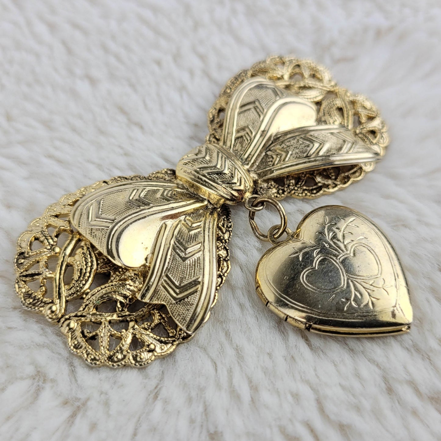1950's Gold Tone Metal Filigree Bow with Heart Locket Pin