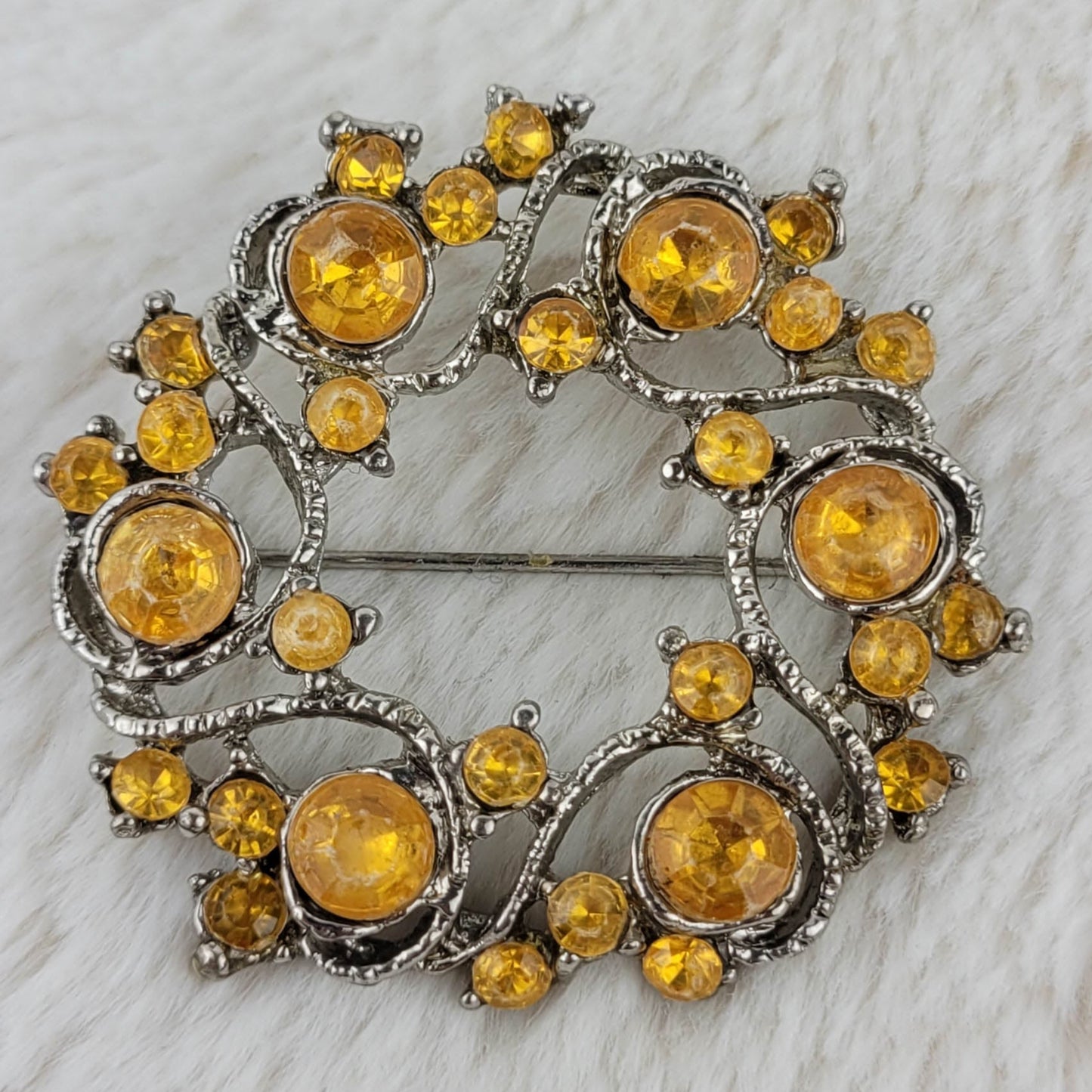 1970's Silver Tone Metal and Yellow Rhinestone Circular Pin