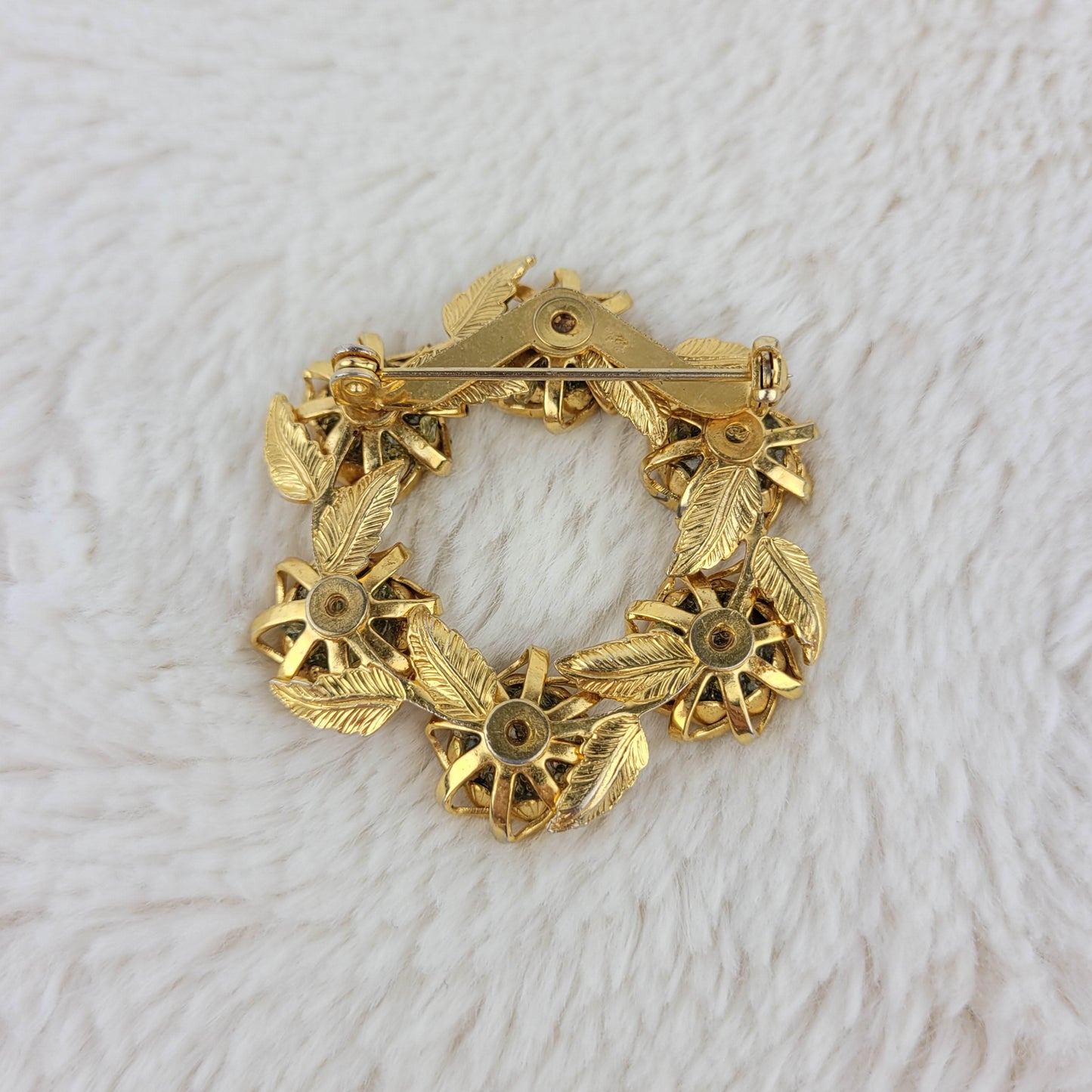 1960 Gold Metal Circular Rose Pin with Peridots