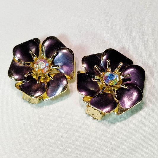1960's Vintage Purple Metal Flower Clip Earrings with an Aurora Borealis Center