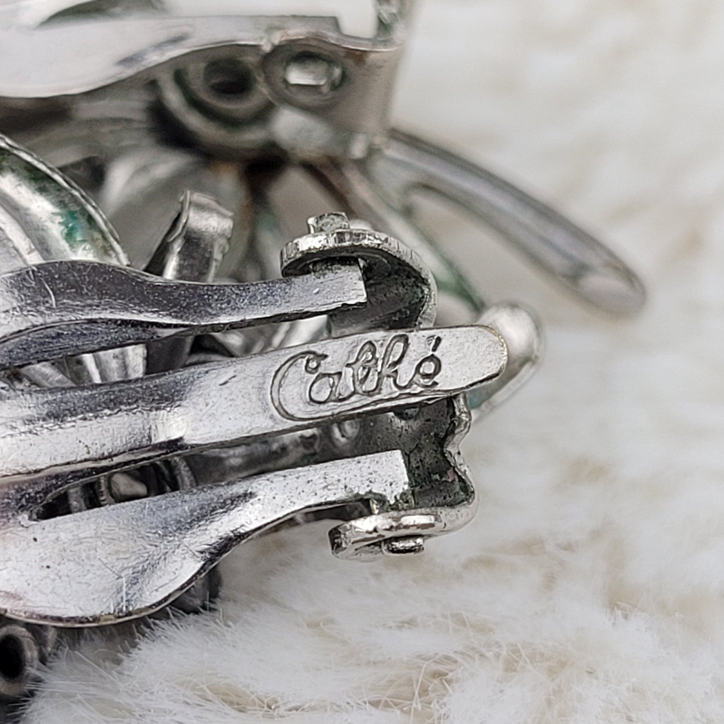 1950's Vintage Oval Clear Crystal Rhinestone Leaf Clip Earrings - Signed