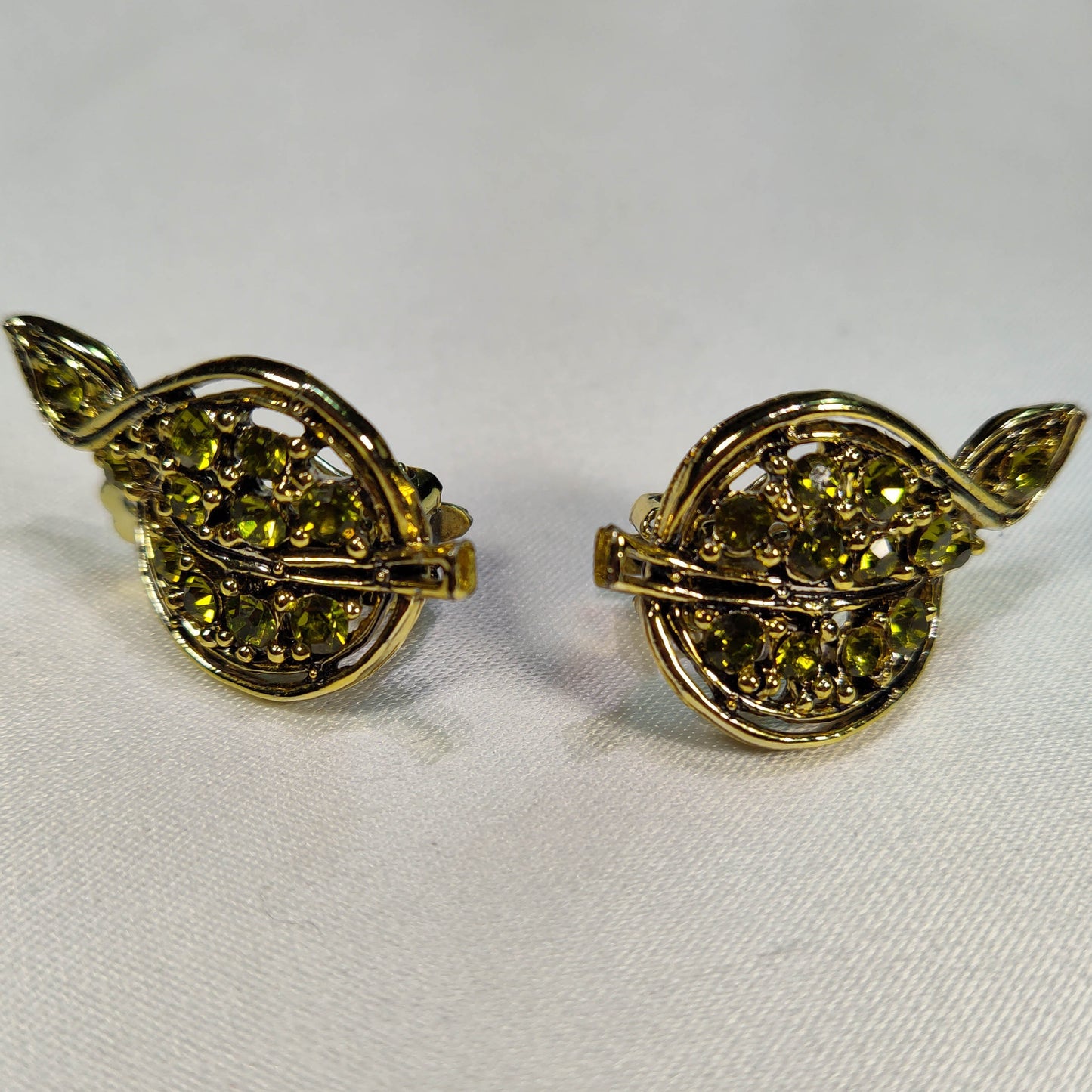 1980's Green Rhinestone and Gold Metal Leaf Clip Earrings