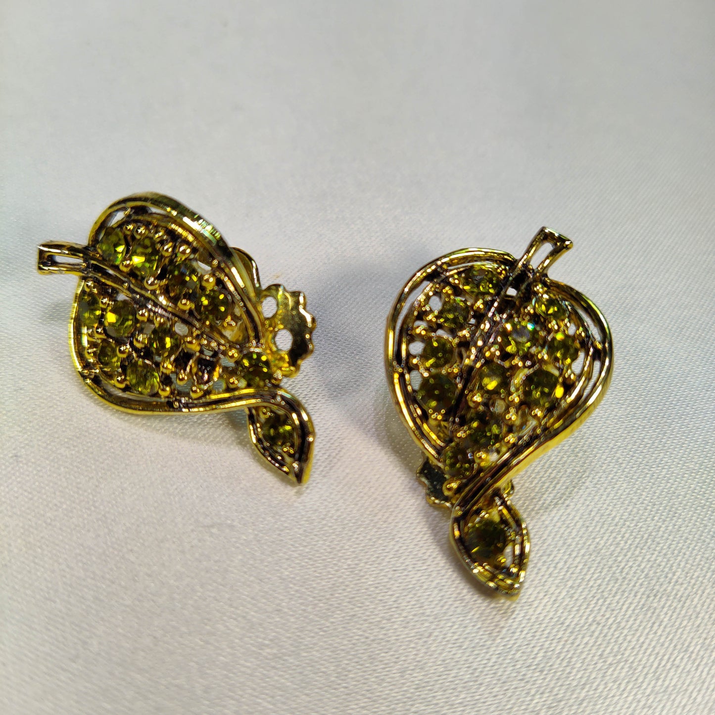1980's Green Rhinestone and Gold Metal Leaf Clip Earrings