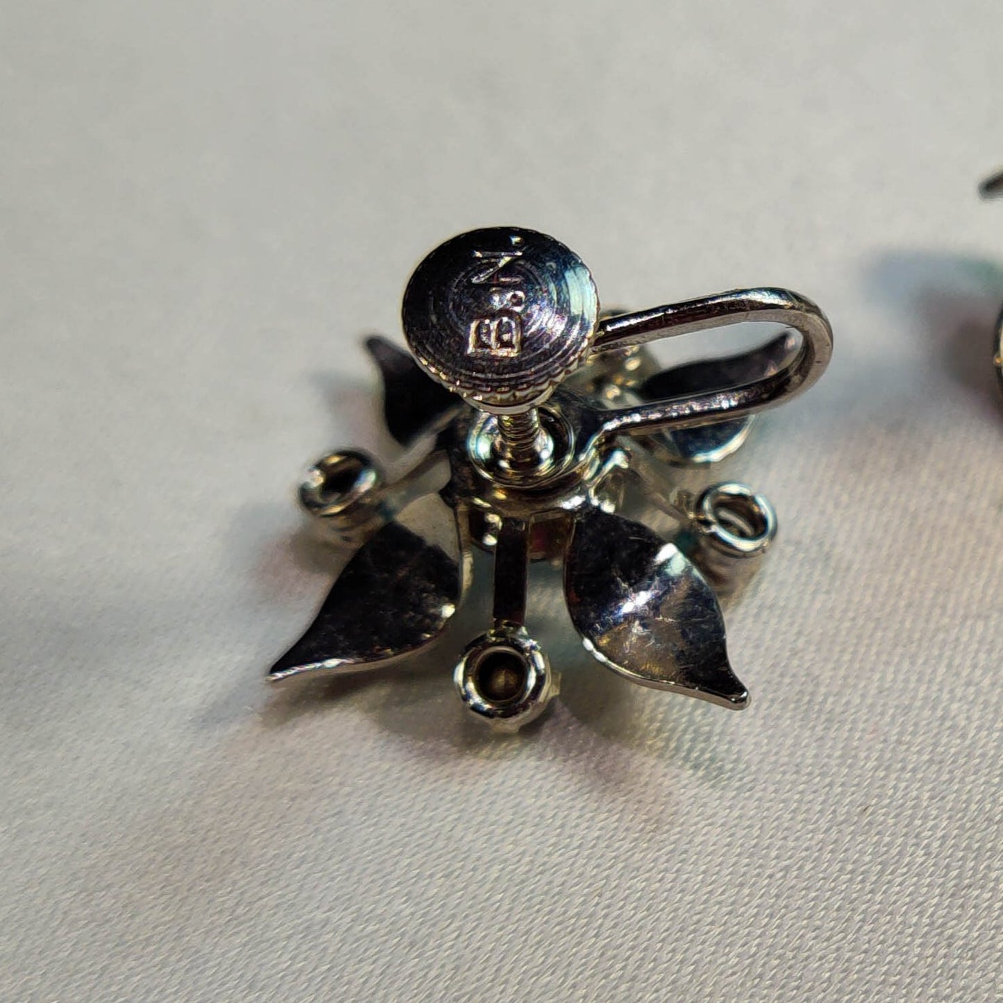 1930's Silver Tone Metal and Blue Rhinestone Flower Screwback Earrings - Signed BN
