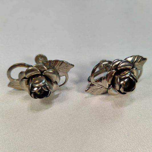 1960's Vintage Screwback Silver Tone Metal Flower Earrings with a Rhinestone Center