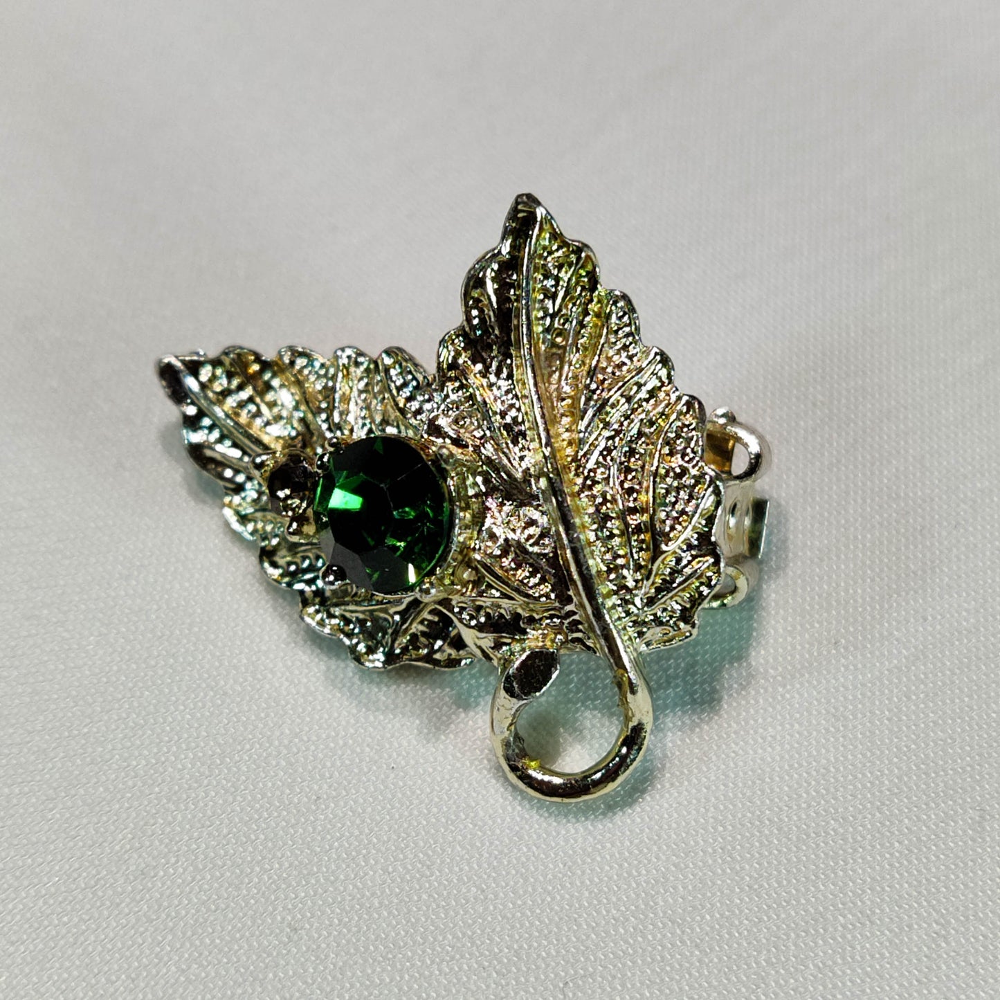 1960's Metal and Green Rhinestone Leaf Clip Earrings
