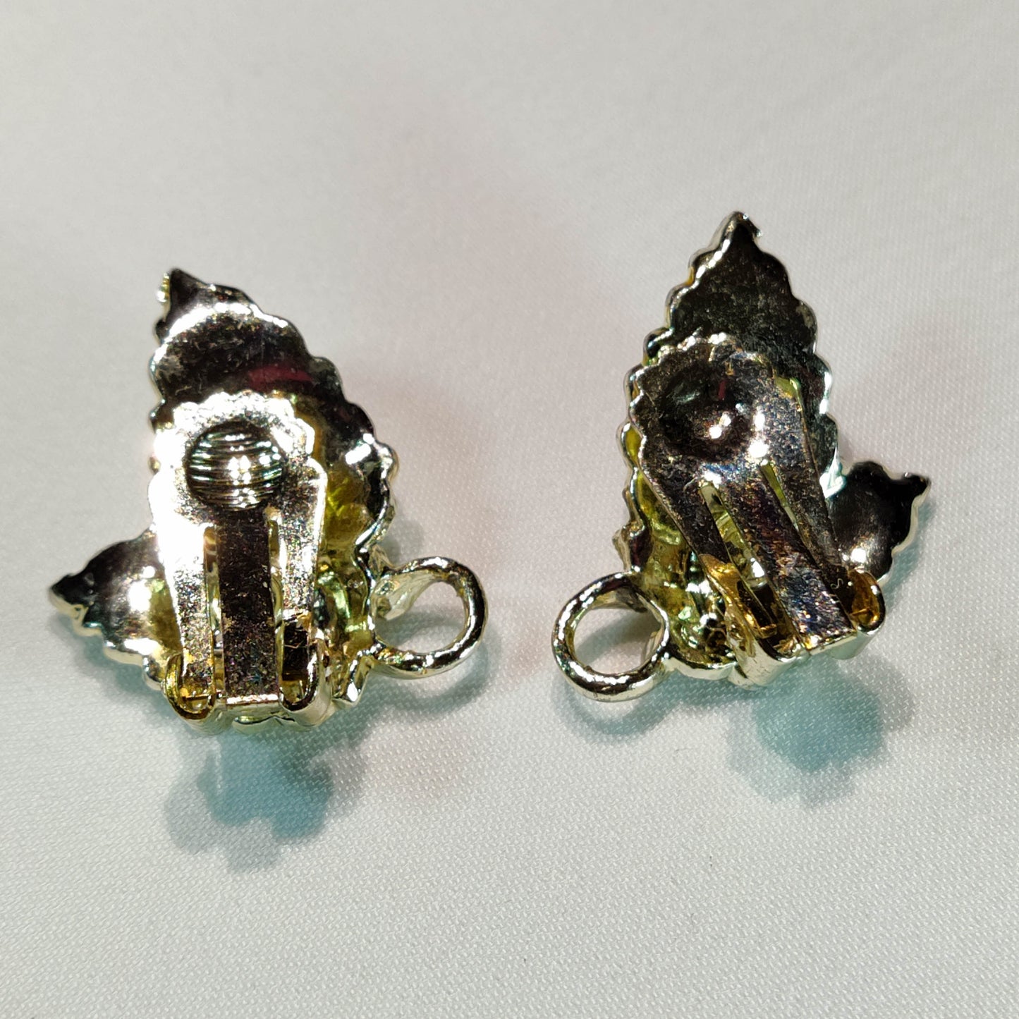 1960's Metal and Green Rhinestone Leaf Clip Earrings