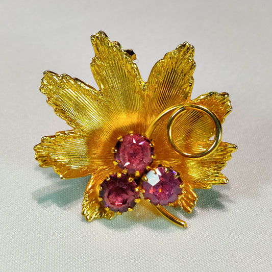 1970s Vintage Flower Pin with Gold Tone Metal and Purple Rhinestones