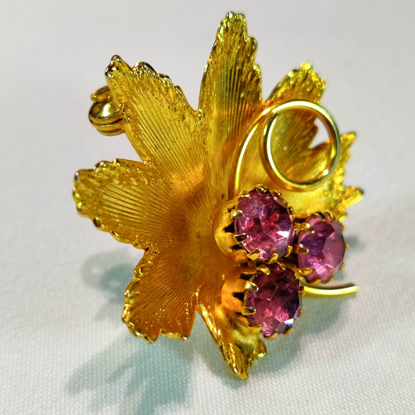 1970's Gold Tone Metal and Purple Rhinestone Flower Pin