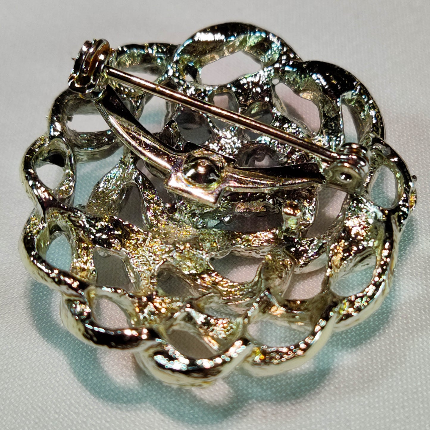 1950s Vintage Circle Pin with Blue Aurora Borealis Rhinestones