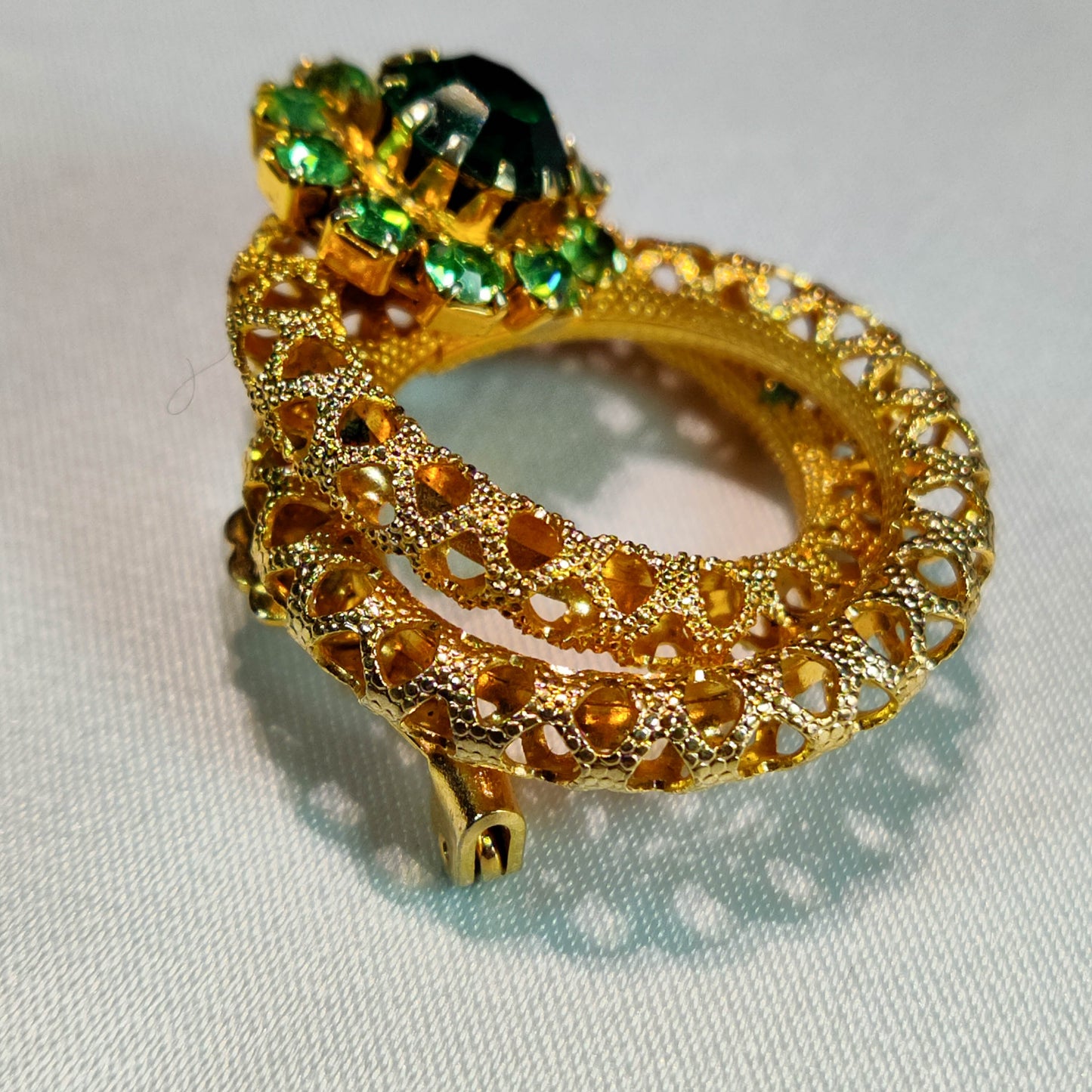 1960's Gold Tone Metal Filigree and Green Rhinestone Pin