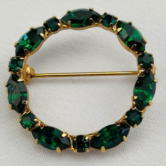 1950's Vintage Green Rhinestone Circle Pin with a Gold Tone Metal Backing