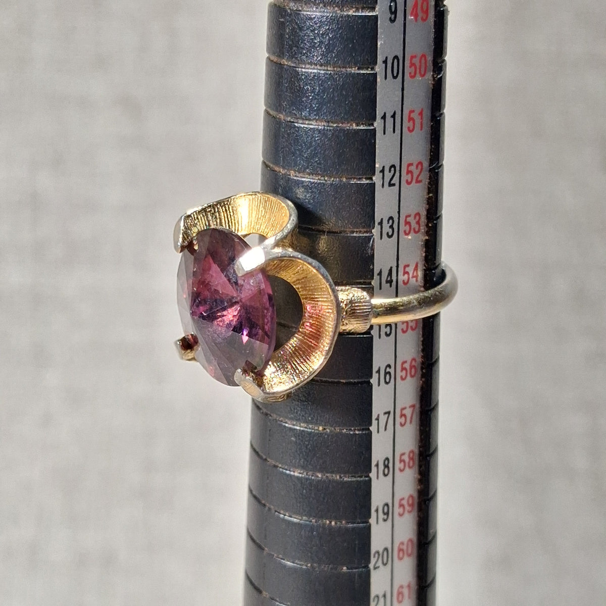 70s Vintage Ring with a Center Purple Rhinestone and Gold Tone Flares: Size 7.0