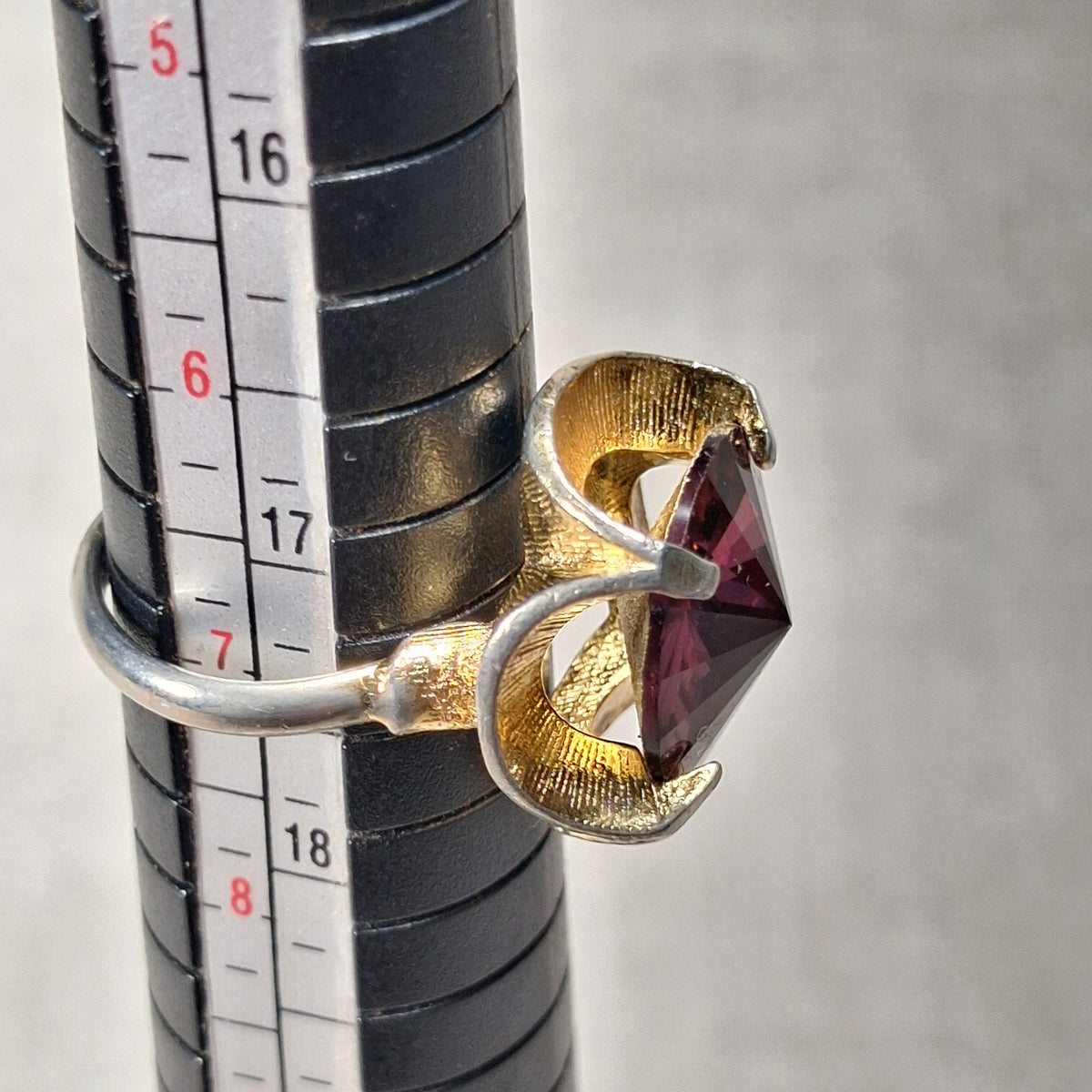 70s Vintage Ring with a Center Purple Rhinestone and Gold Tone Flares: Size 7.0