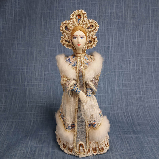 Vintage Porcelain Figurine: White and Blue in Traditional Dress