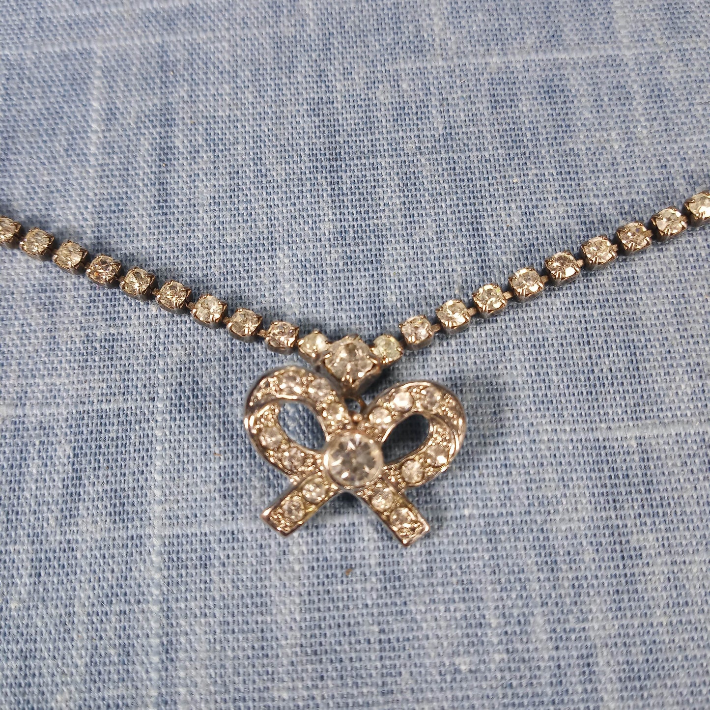 1990s Vintage Necklace with Clear Rhinestones and a Rhinestone Bow Pendant