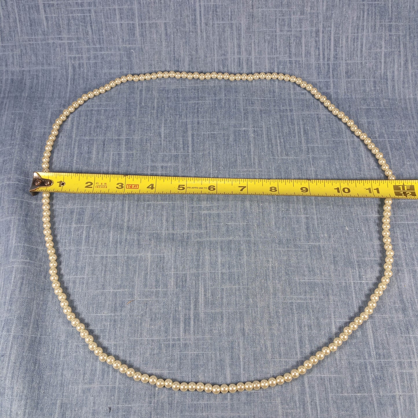 1970s Vintage Necklace: Single Continuous String of White Pearl Beads