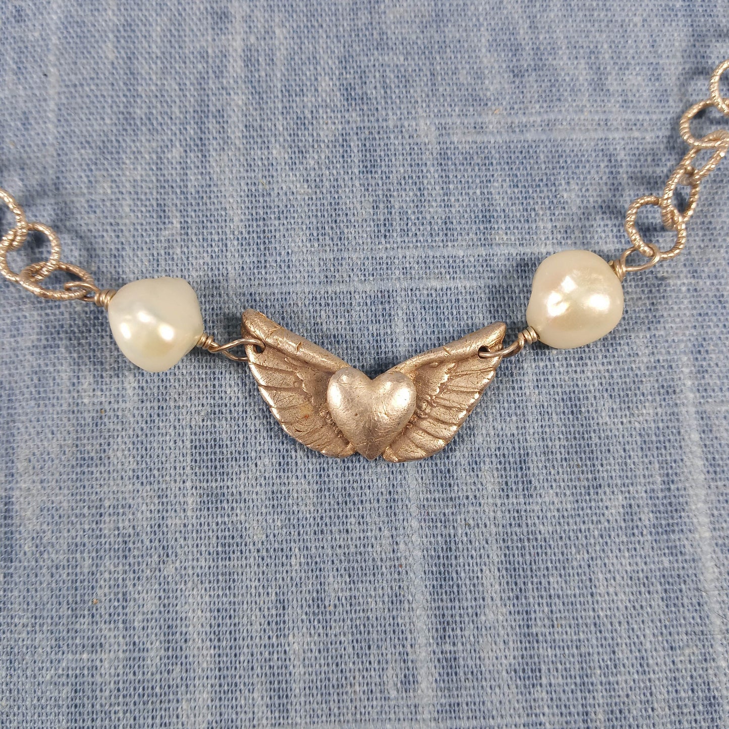 1960s Vintage Necklace with Silver Tone Chain and Fresh Pearls: Winged Pendant