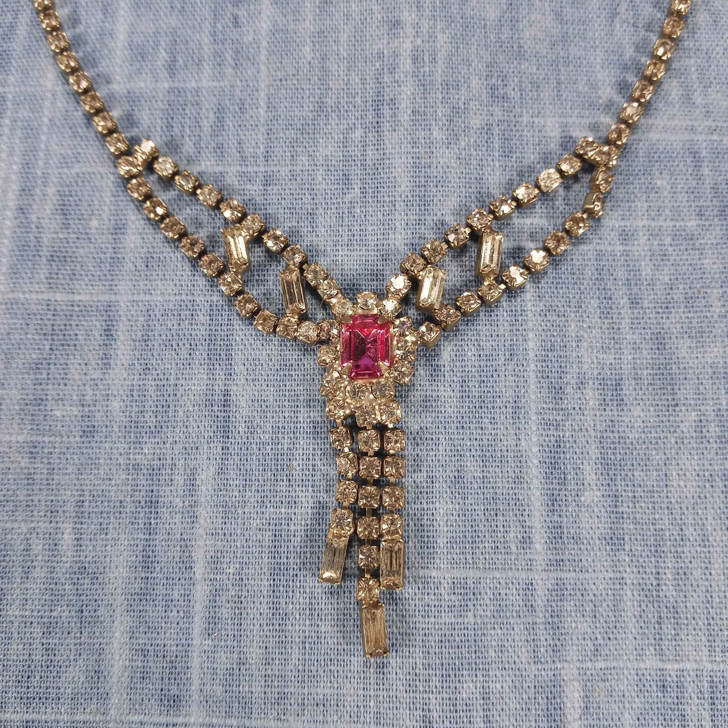 1950s Vintage Dangle Necklace with Clear Rhinestones and a Center Cut Pink Glass