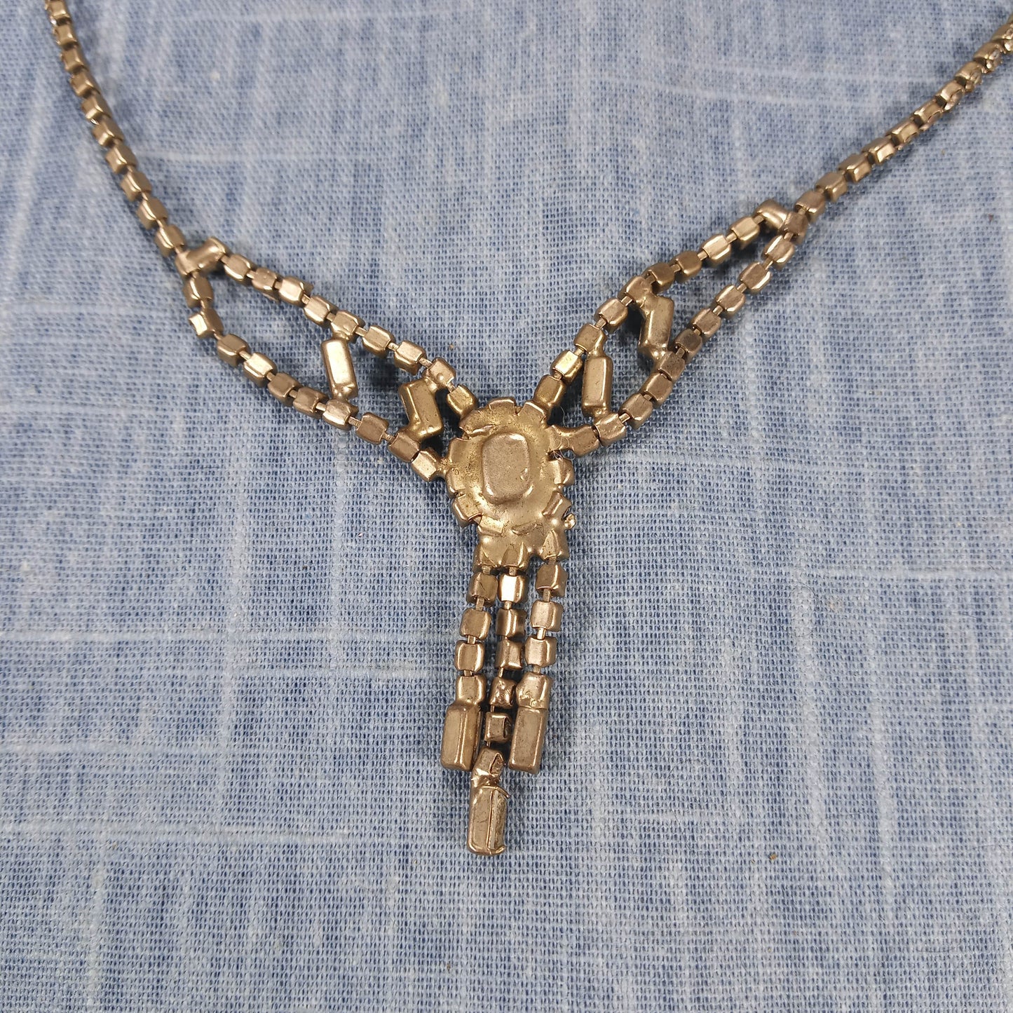 1950s Vintage Dangle Necklace with Clear Rhinestones and a Center Cut Pink Glass